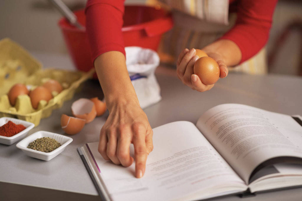 Baking Tip #1 For the Perfect Cake, Lady reading a recipe